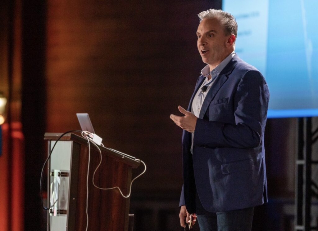 George Leith speaking at a B2B sales conference about the future of selling